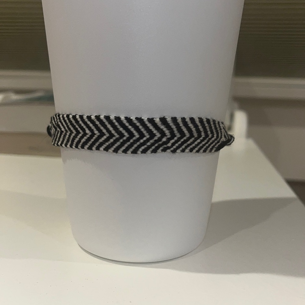 adjustable black and white thread bracelet